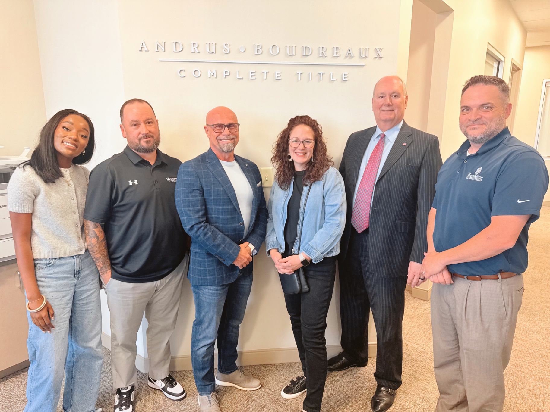 Attiya with wholesale students at the Andrus Boudreaux Complete Title office